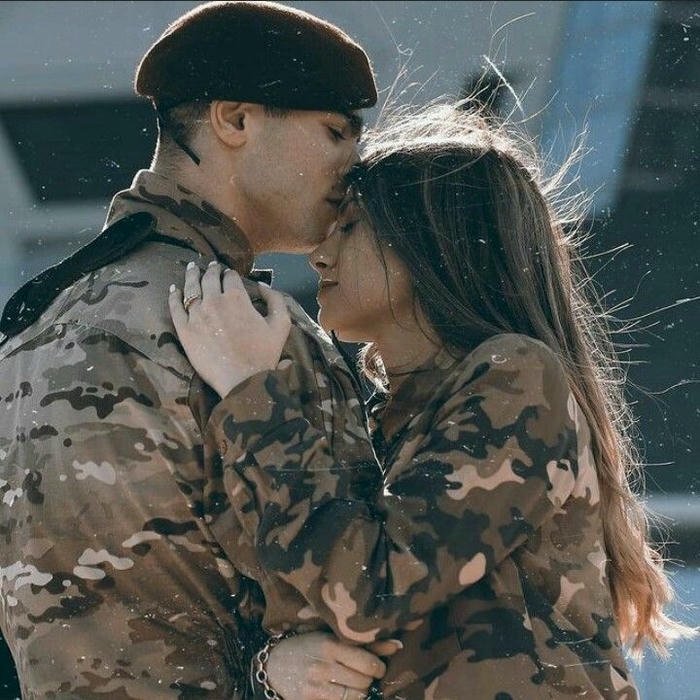 army couple holding hands dp