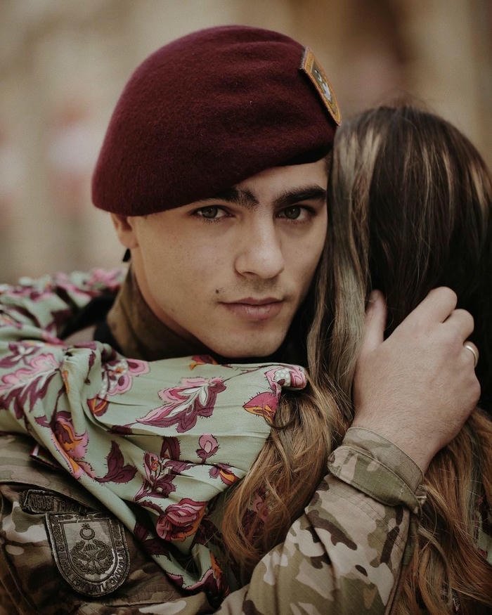 army couple posing dp