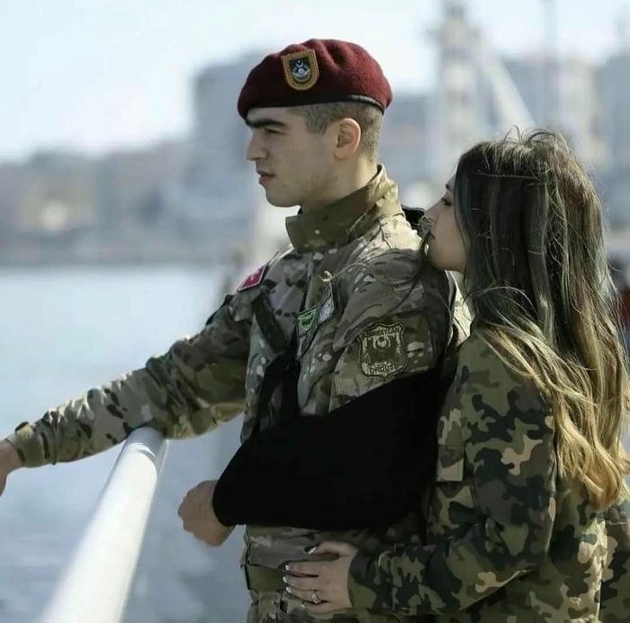 army couple with military gear dp
