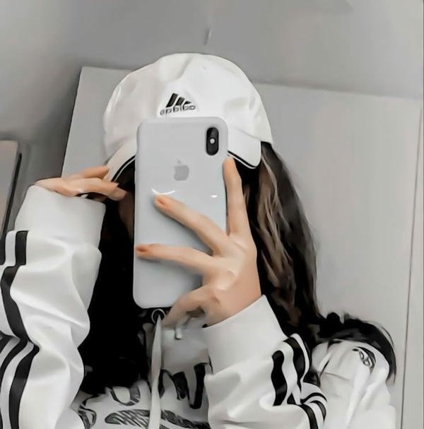 girl in cap and hoodie dp
